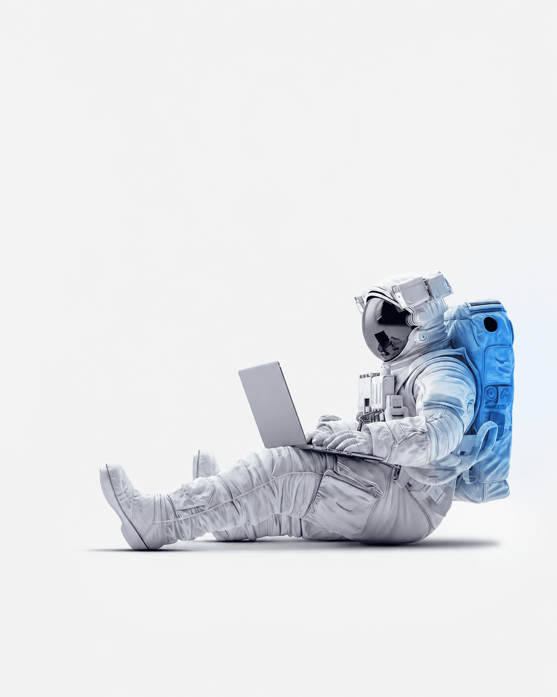 An astronaut working on a laptop